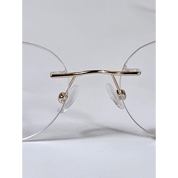 Pure Airlock Caliber 204 710 Titanium Eyeglasses Frame Gold Rimless 51-18 145 - Picture 7 of 16